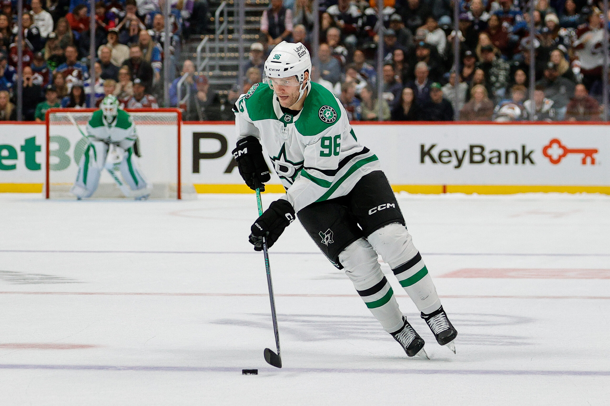 Oct 11, 2025; Denver, Colorado, USA; Dallas Stars right wing Mikko Rantanen (96) skates the puck up in a shootout against the Colorado Avalanche at Ball Arena. Mandatory Credit: Isaiah J. Downing-Imagn Images