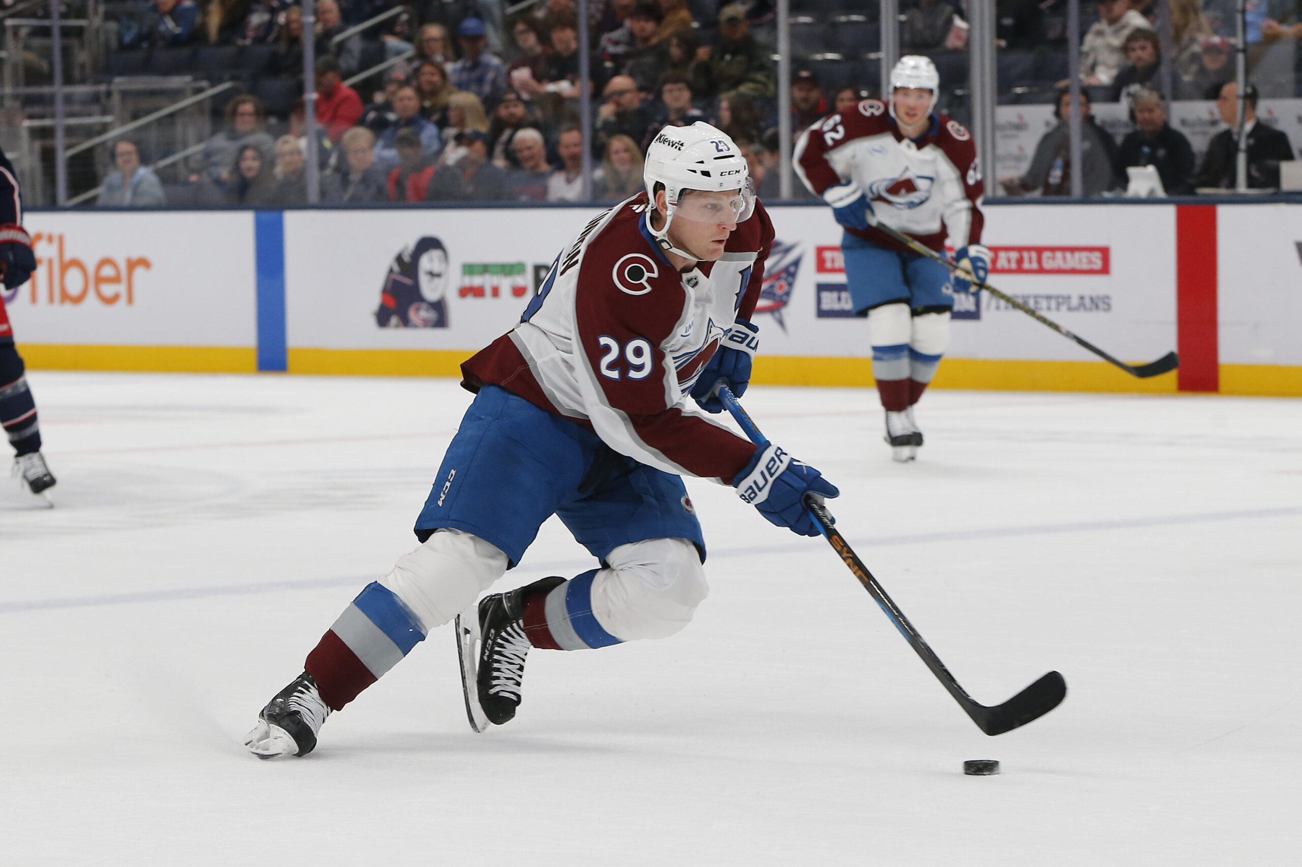 Oct 16, 2025; Columbus, Ohio, USA; Colorado Avalanche center Nathan MacKinnon (29) controls the puck against the Columbus Blue Jackets during the first period at Nationwide Arena. Mandatory Credit: Russell LaBounty-Imagn Images