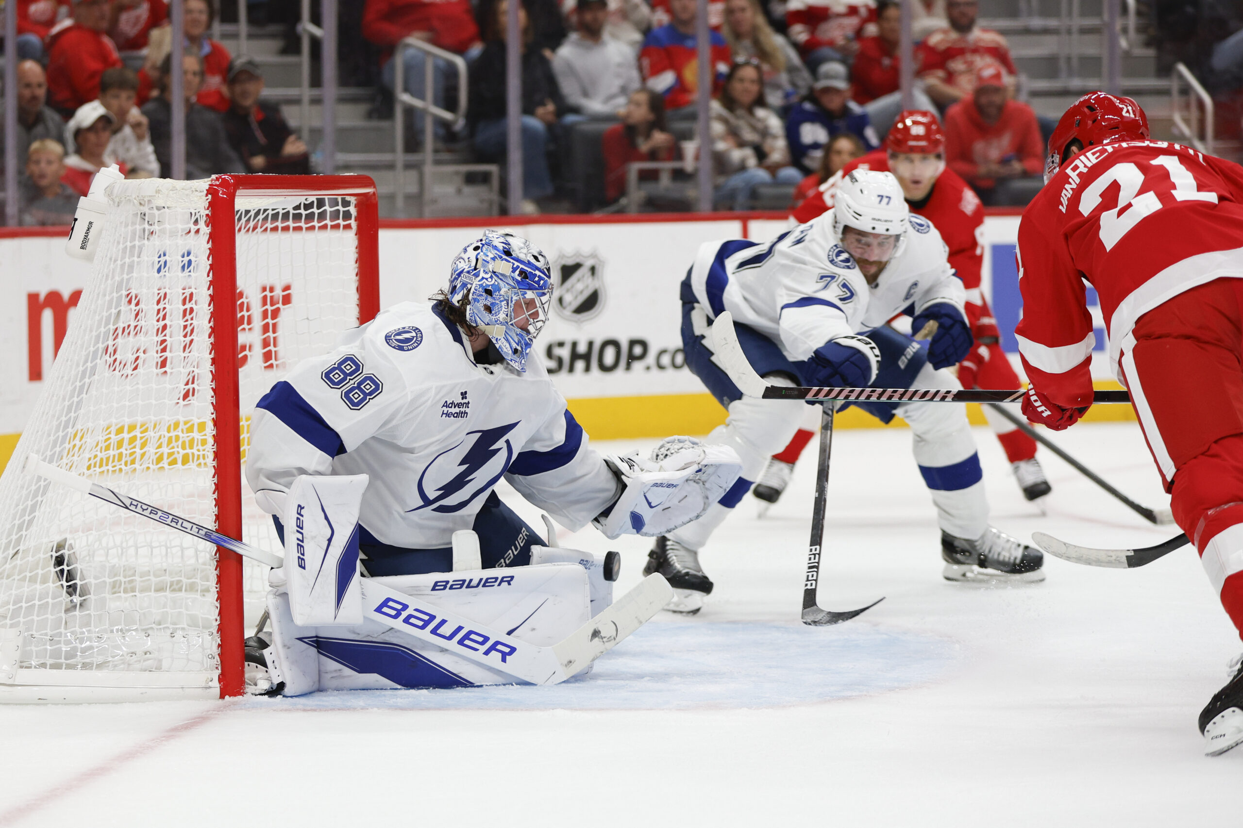 Oct 17, 2025; Detroit, Michigan, USA; Tampa Bay Lightning goaltender Andrei Vasilevskiy (88) blocks a shot by Detroit Red Wings left wing James van Riemsdyk (21) during the second period at Little Caesars Arena. Mandatory Credit: Brian Bradshaw Sevald-Imagn Images
