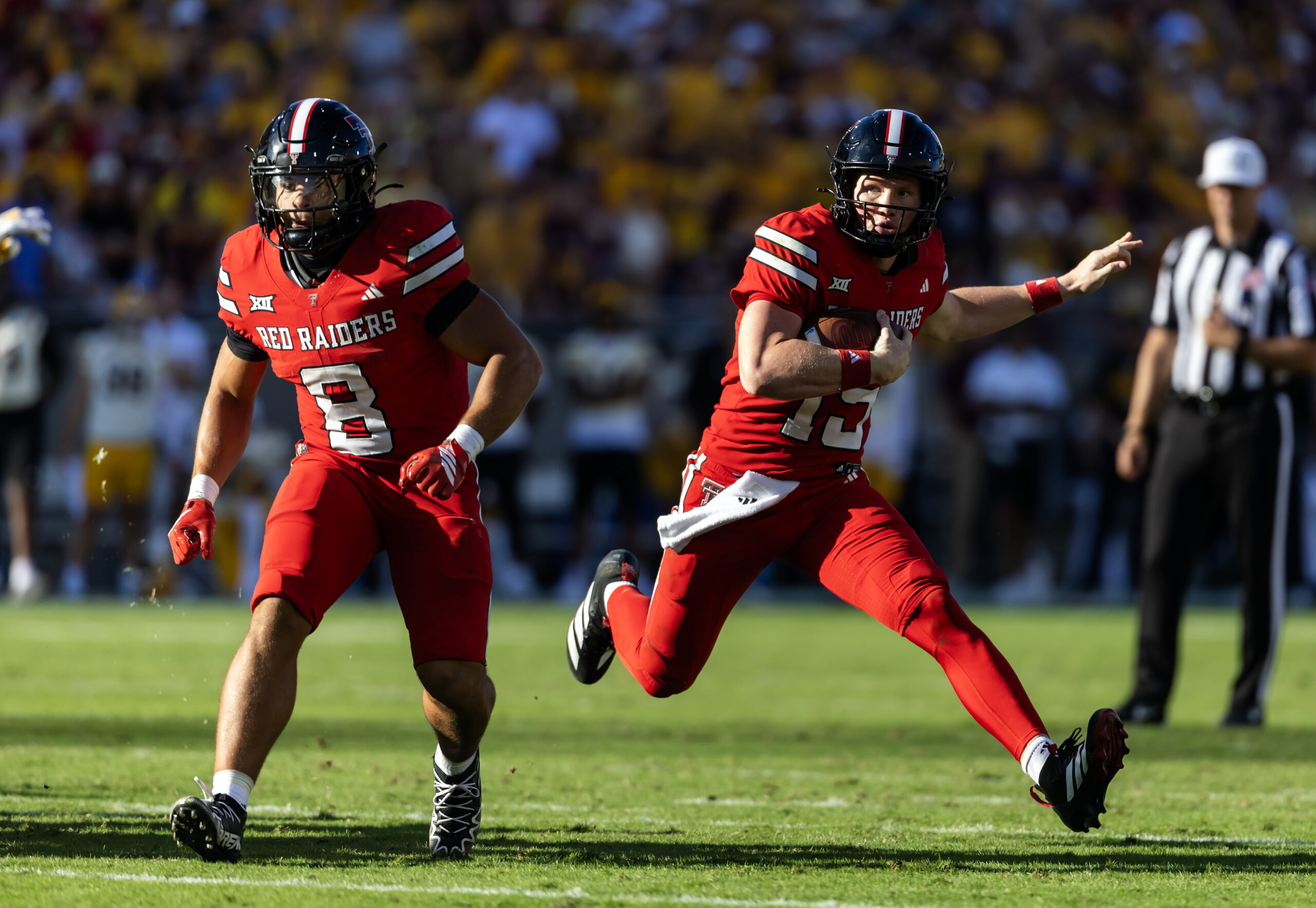Oct 18, 2025; Tempe, Arizona, USA; Texas Tech Red Raiders running back Cameron Dickey (8) blocks for quarterback Will Hammond (15) against the Arizona State Sun Devils at Mountain America Stadium. Mandatory Credit: Mark J. Rebilas-Imagn Images