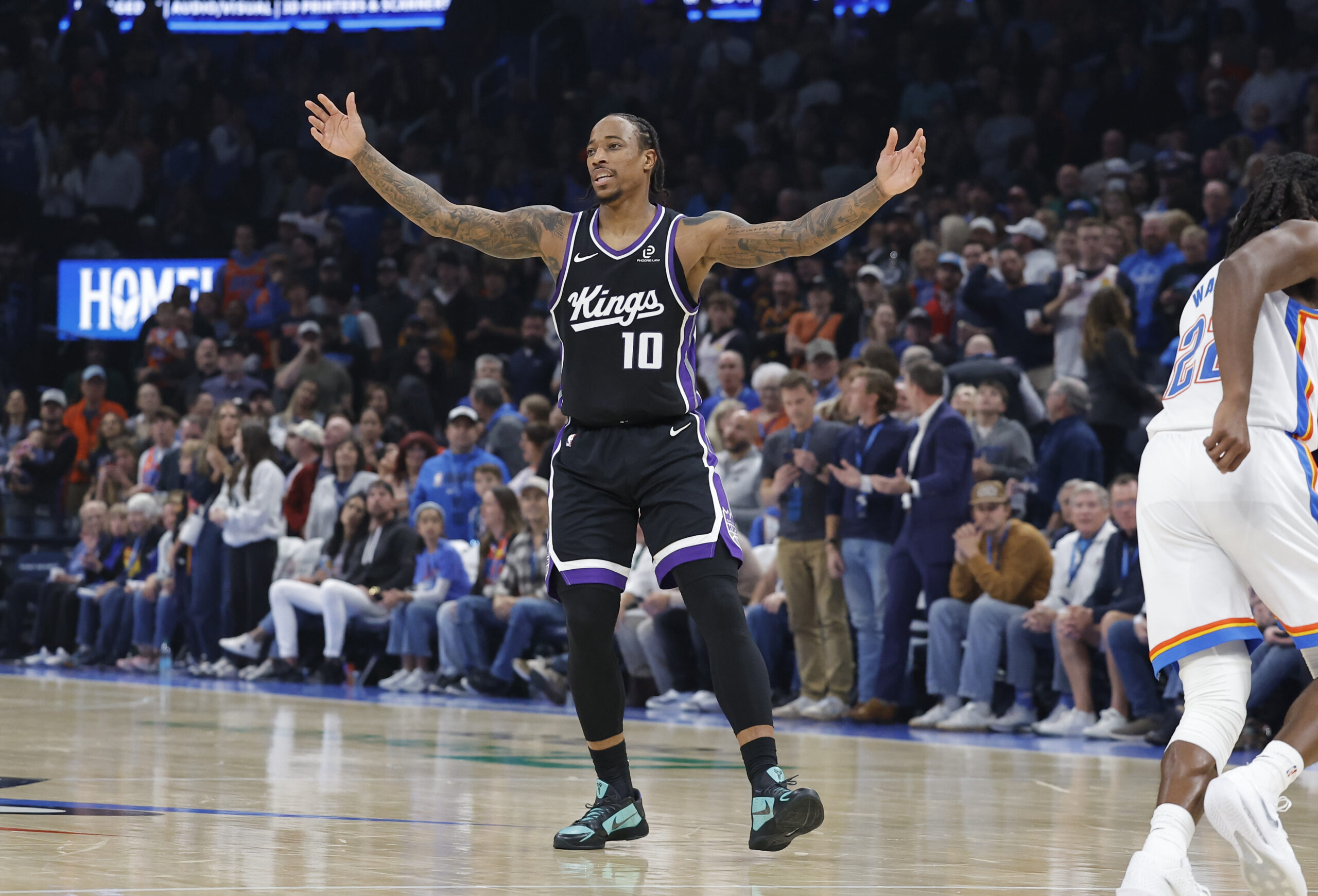 Oct 28, 2025; Oklahoma City, Oklahoma, USA; Sacramento Kings guard DeMar DeRozan (10) reacts after scoring against the Oklahoma City Thunder during the second quarter at Paycom Center. Mandatory Credit: Alonzo Adams-Imagn Images