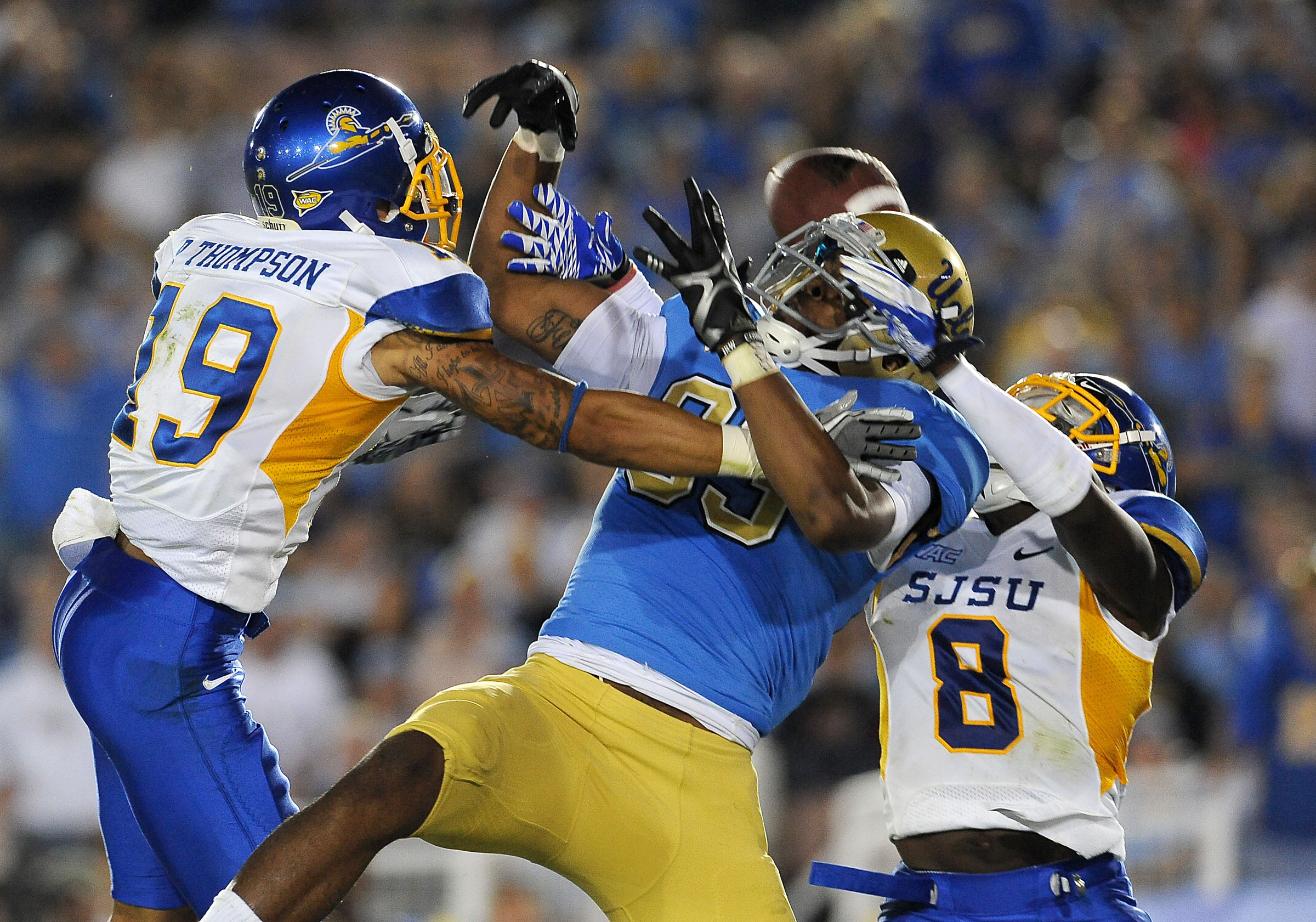 Sep 10, 2011; Pasadena, CA, USA;  San Jose State Spartans cornerback Peyton Thompson (19) and cornerback Brandon Driver (8) break up a pass intended for UCLA Bruins wide receiver Nelson Rosario (83) during the 4th quarter in the end zone at the Rose Bowl.  UCLA won 27-17. Mandatory Credit: Jayne Kamin-Oncea-Imagn Images