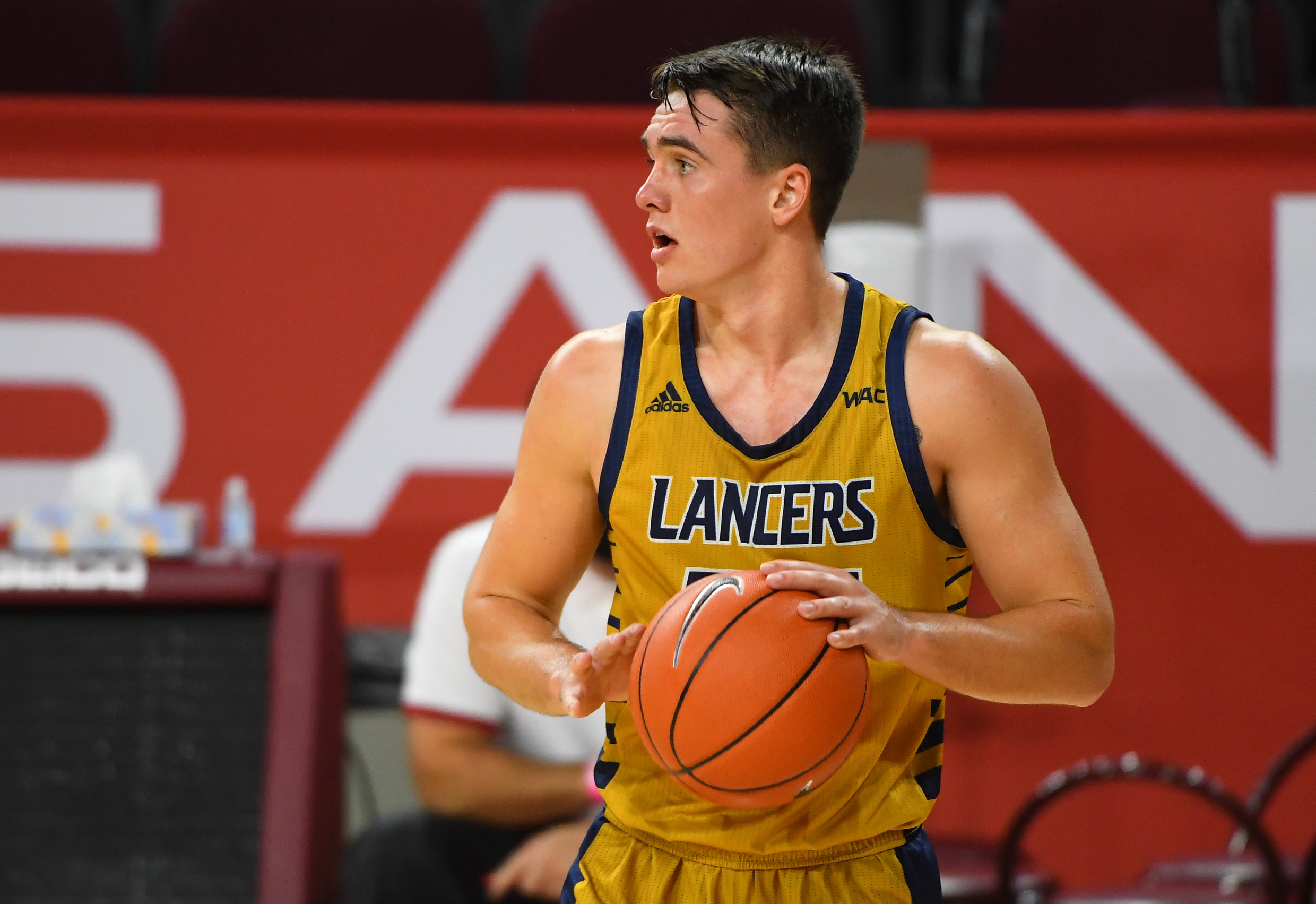 Nov 25, 2020; Los Angeles, California, USA;  California Baptist Lancers guard Ty Rowell (25) controls the ball against the USC Trojans in the second half at the Galen Center. Mandatory Credit: Jayne Kamin-Oncea-Imagn Images