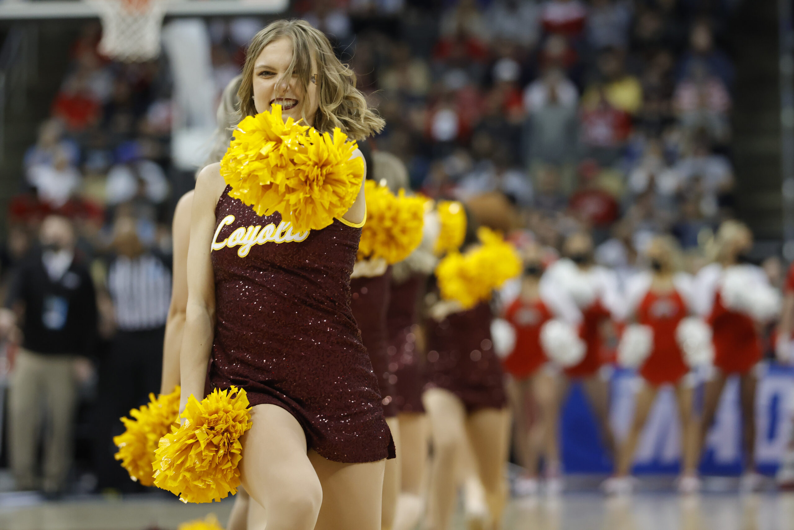 Mar 18, 2022; Pittsburgh, PA, USA; against the Loyola (Il) Ramblers cheerleaders in the first half against the Ohio State Buckeyes during the first round of the 2022 NCAA Tournament at PPG Paints Arena. Mandatory Credit: Geoff Burke-Imagn Images