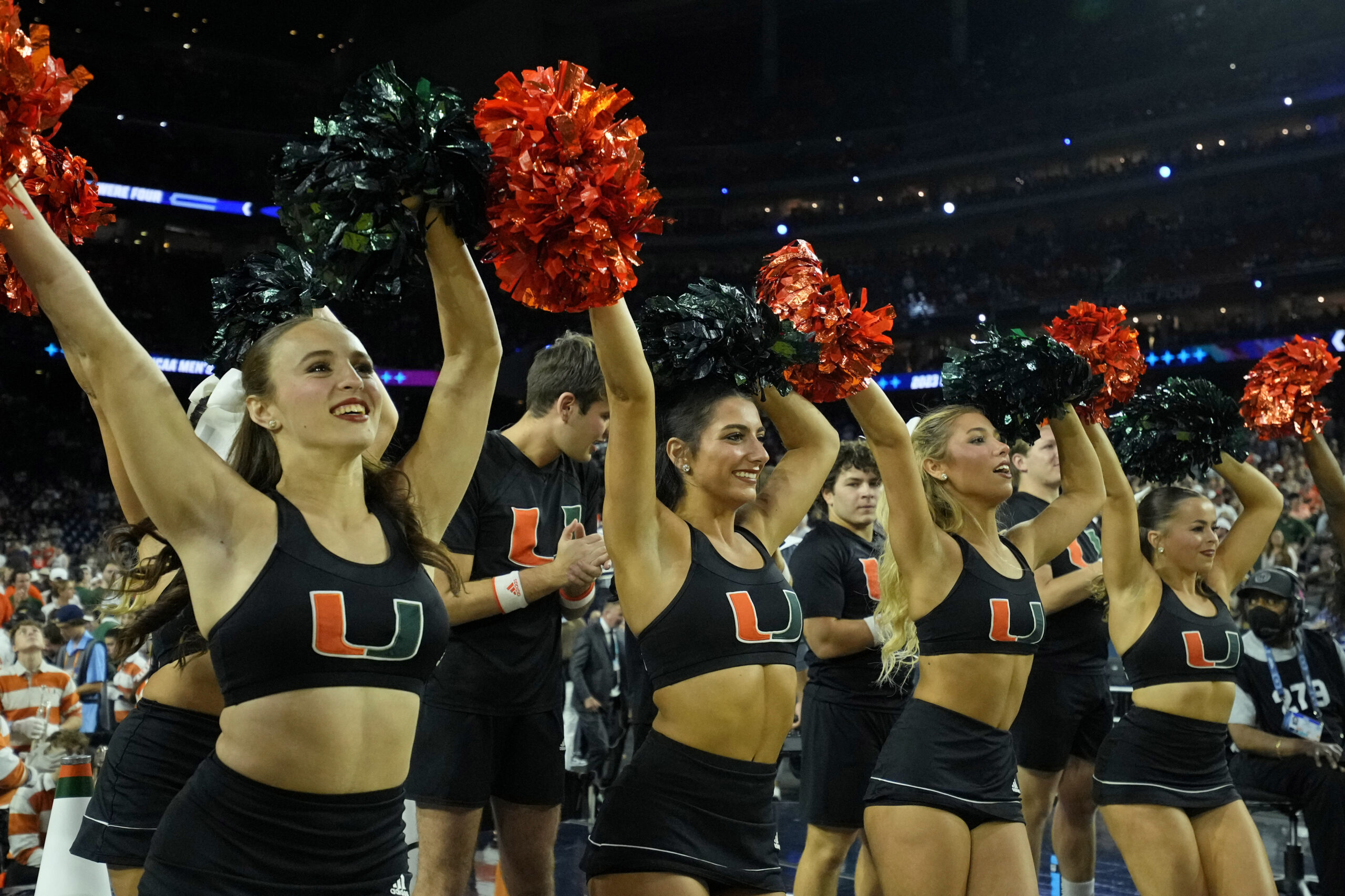 Apr 1, 2023; Houston, TX, USA; The Miami (Fl) Hurricanes cheerleaders perform before the game against the Connecticut Huskies in the semifinals of the Final Four of the 2023 NCAA Tournament at NRG Stadium. Mandatory Credit: Bob Donnan-Imagn Images
