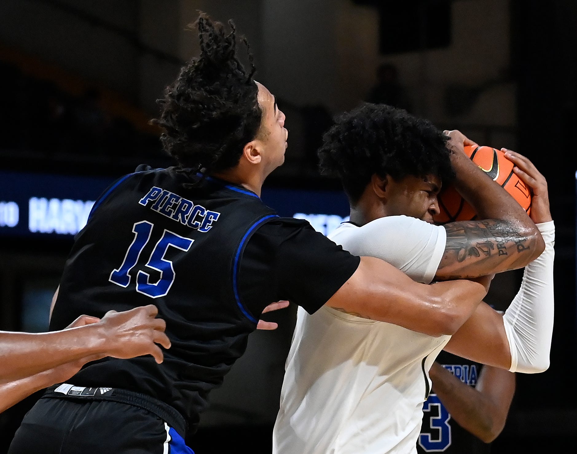 Vanderbilt forward Colin Smith (1) protects the ball from Presbyterian forward Jonah Pierce (15) during the second half of an NCAA college basketball game Tuesday, Nov. 7, 2023, in Nashville, Tenn. Vanderbilt lost 68-62.