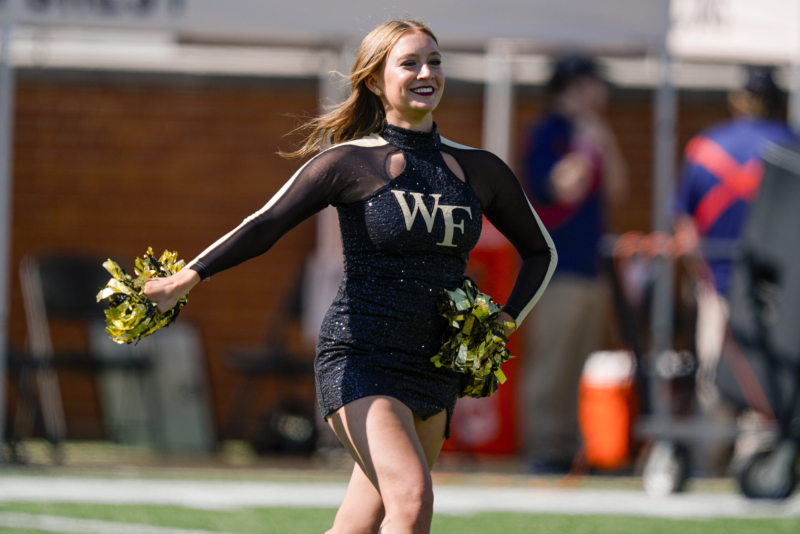 Oct 12, 2024; Winston-Salem, North Carolina, USA; Wake Forest Demon Deacons cheerleader during the first half against the Clemson Tigers at Allegacy Federal Credit Union Stadium. Mandatory Credit: Jim Dedmon-Imagn Images