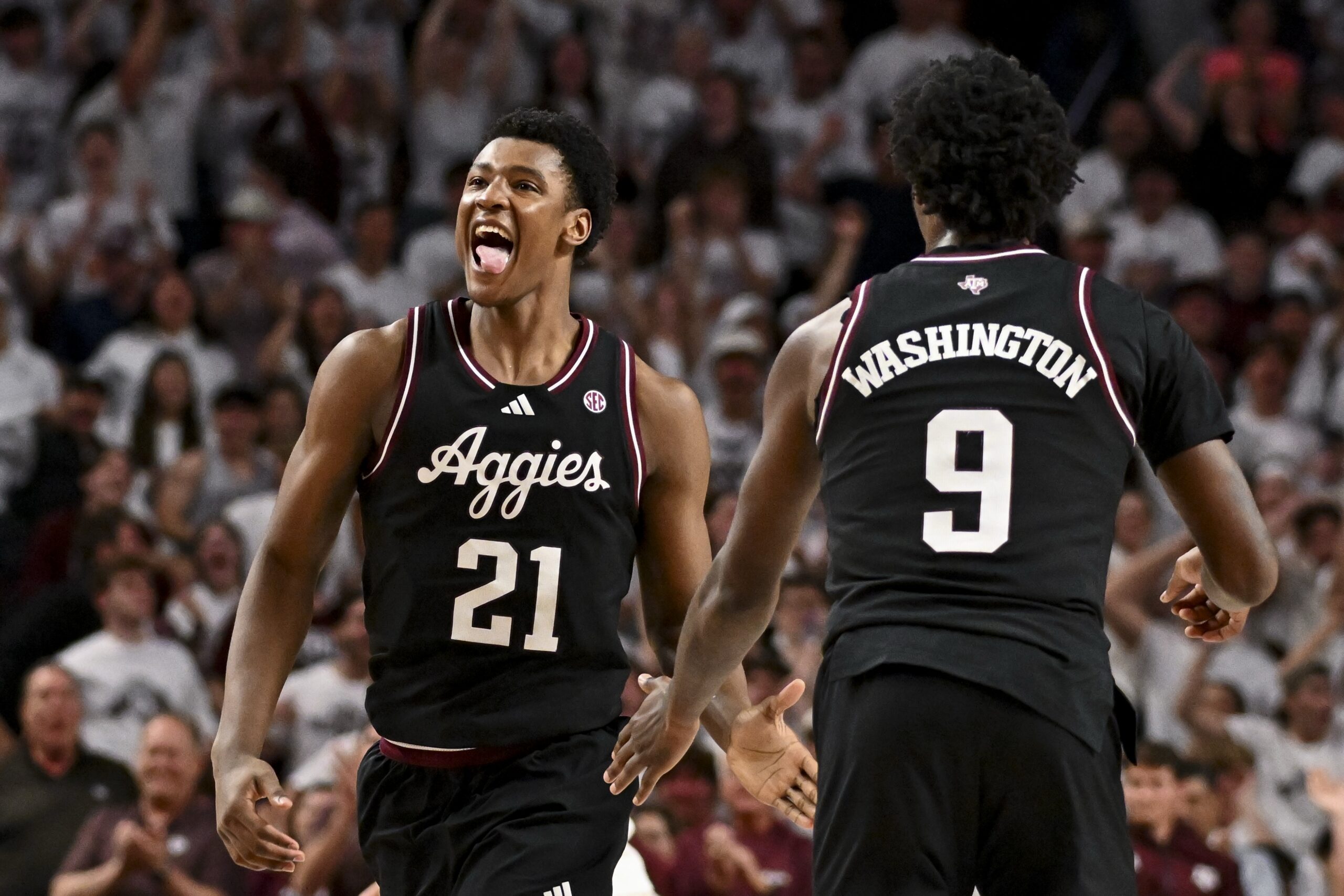 Mar 4, 2025; College Station, Texas, USA; Texas A&M Aggies forward Pharrel Payne (21) rects during the second half against the Auburn Tigers at Reed Arena. Mandatory Credit: Maria Lysaker-Imagn Images