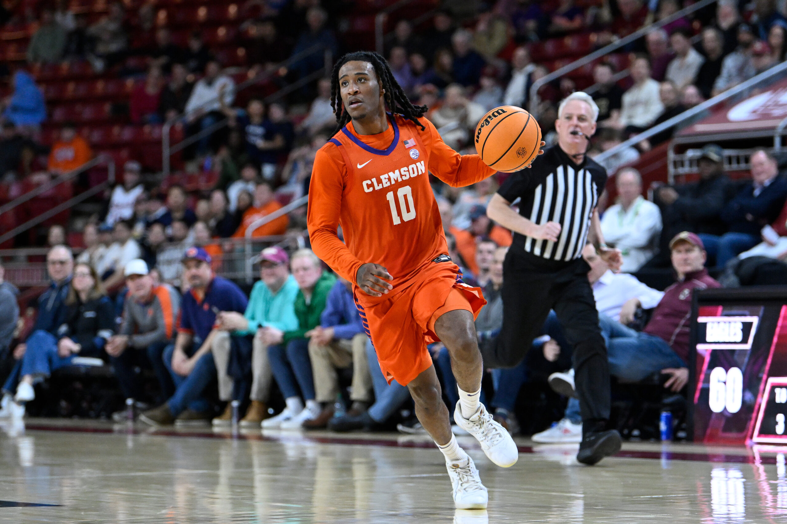 Mar 5, 2025; Chestnut Hill, Massachusetts, USA; Clemson Tigers guard Del Jones (10)  dribbles the ball during the second half against the Boston College Eagles at Conte Forum. Mandatory Credit: Eric Canha-Imagn Images
