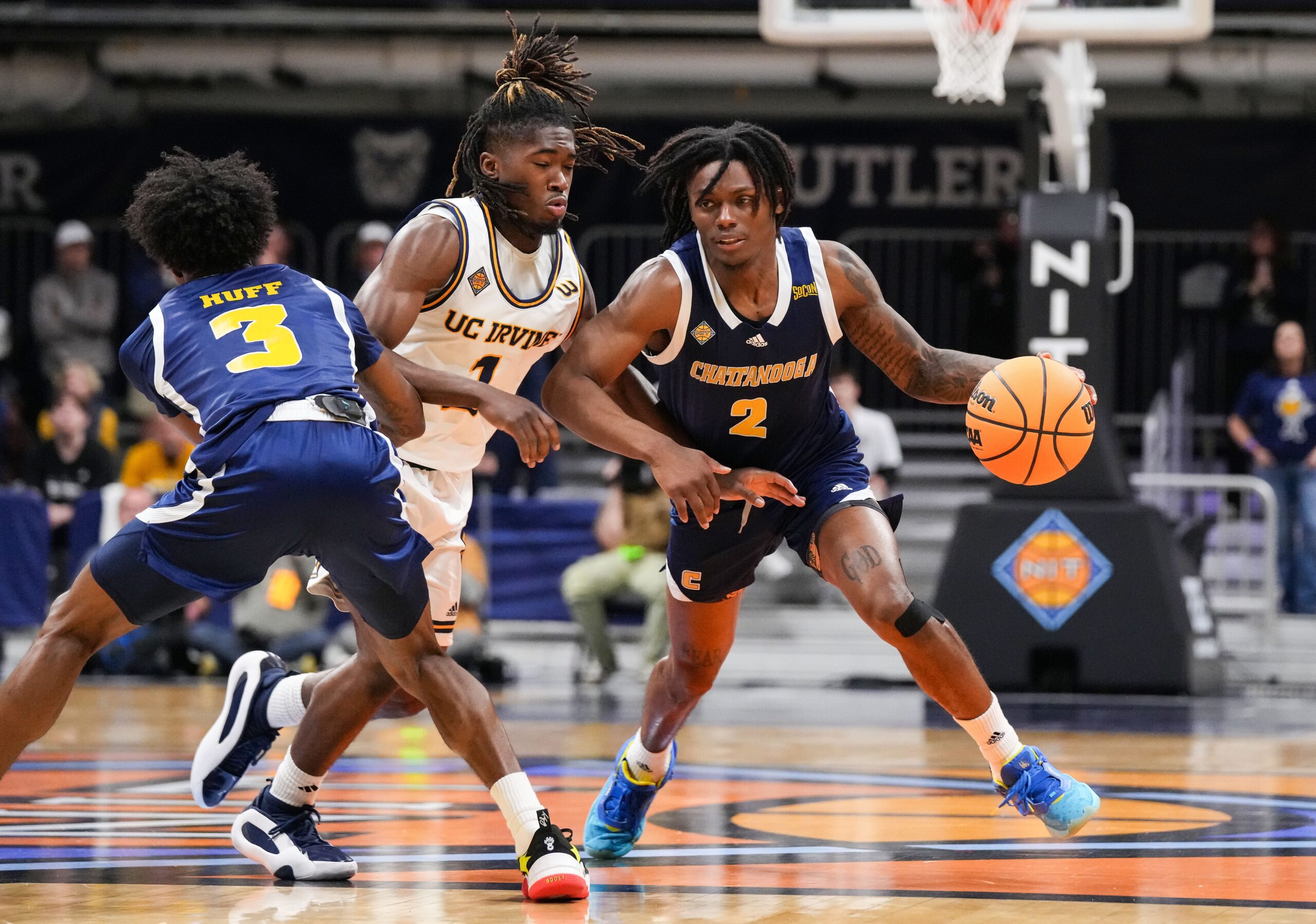 Chattanooga Mocs guard Trey Bonham (2) rushes up the court Thursday, April 3, 2025, during the National Invitional Tournament at Hinkle Fieldhouse in Indianapolis.