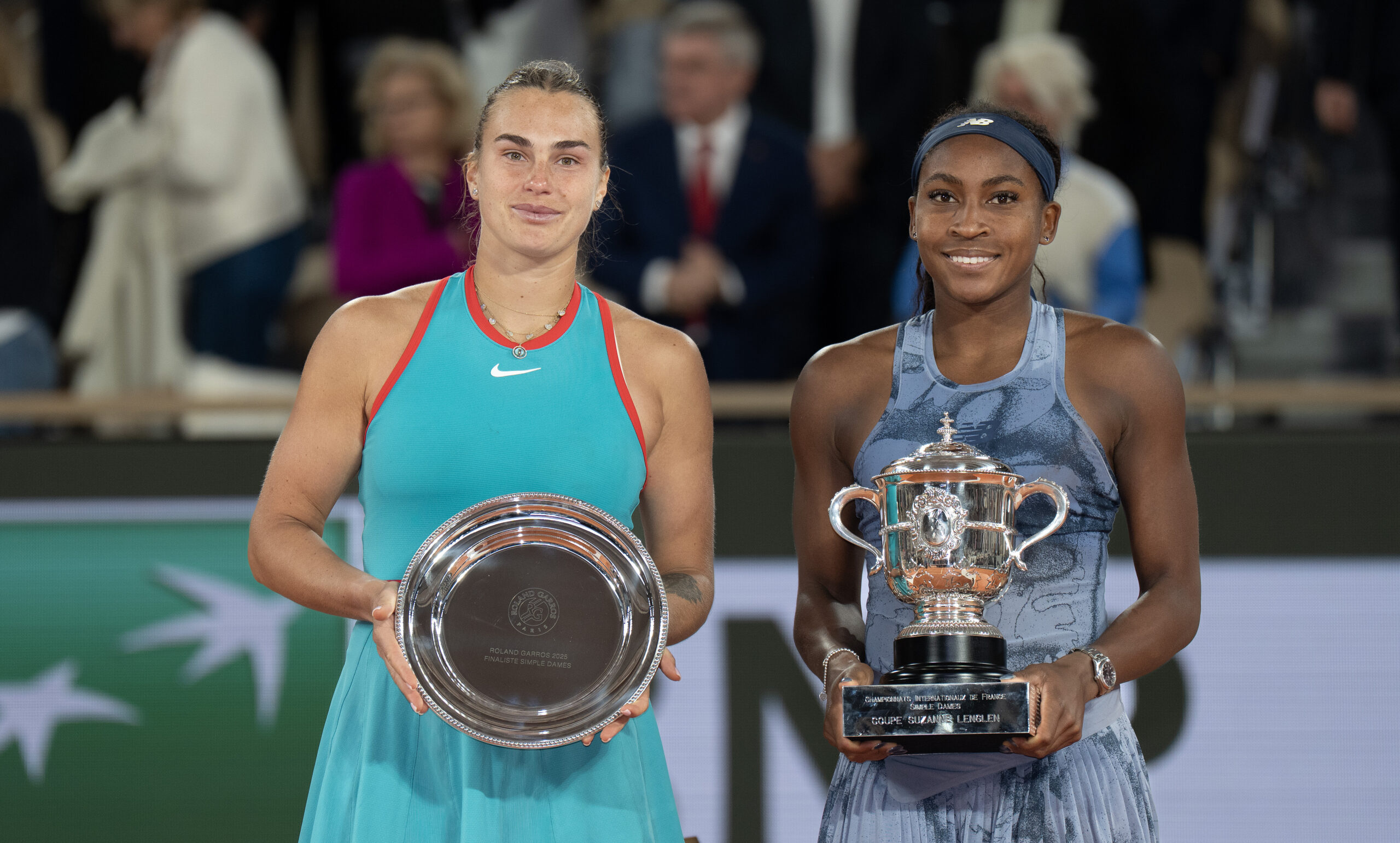 Jun 7, 2025; Paris, FR;  Coco Gauff of the United States poses with Aryna Sabalenka after their match on day 14 at Roland Garros Stadium. Mandatory Credit: Susan Mullane-Imagn Images