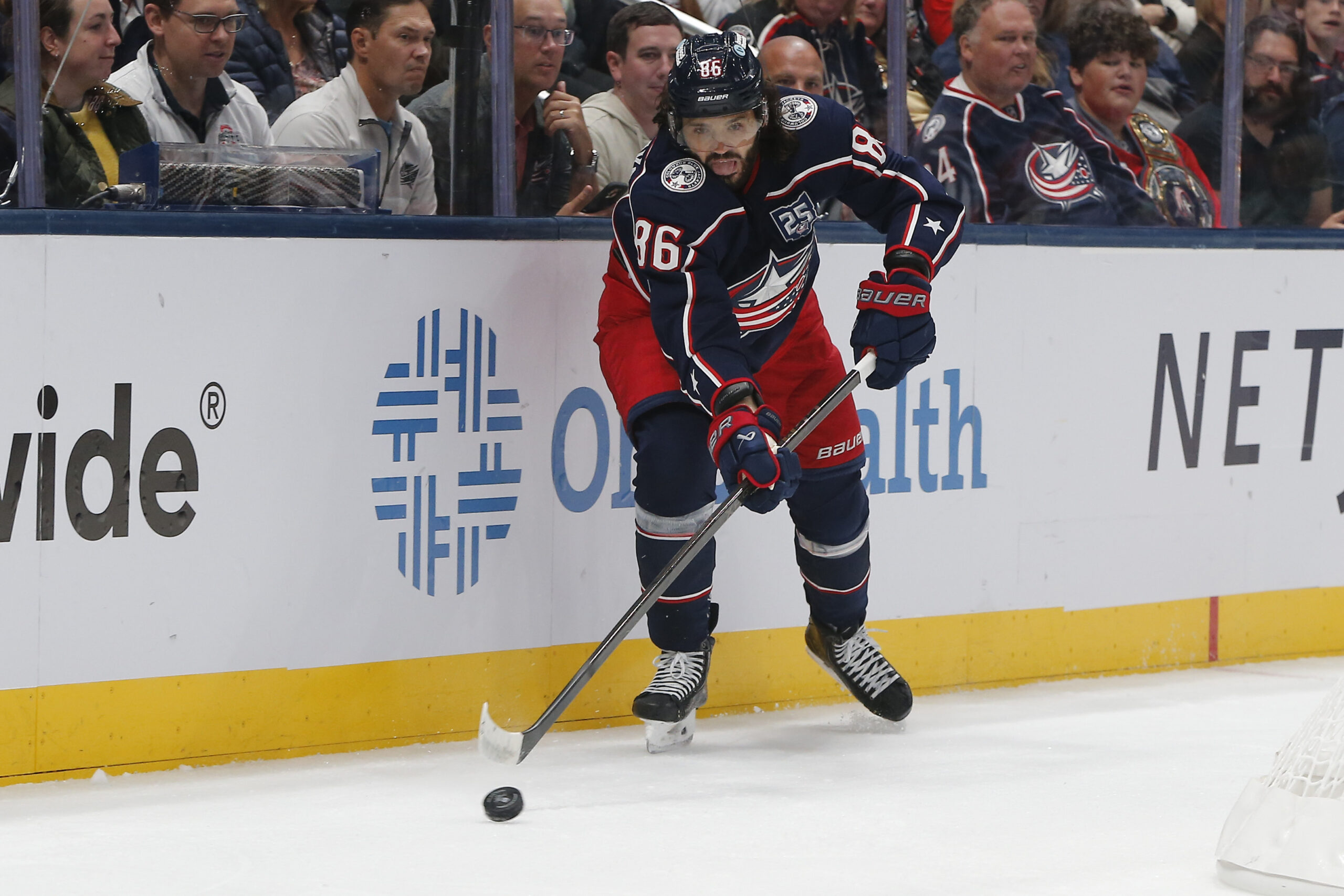 Oct 13, 2025; Columbus, Ohio, USA; Columbus Blue Jackets right wing Kirill Marchenko (86) makes a pass against the New Jersey Devils during the first period at Nationwide Arena. Mandatory Credit: Russell LaBounty-Imagn Images