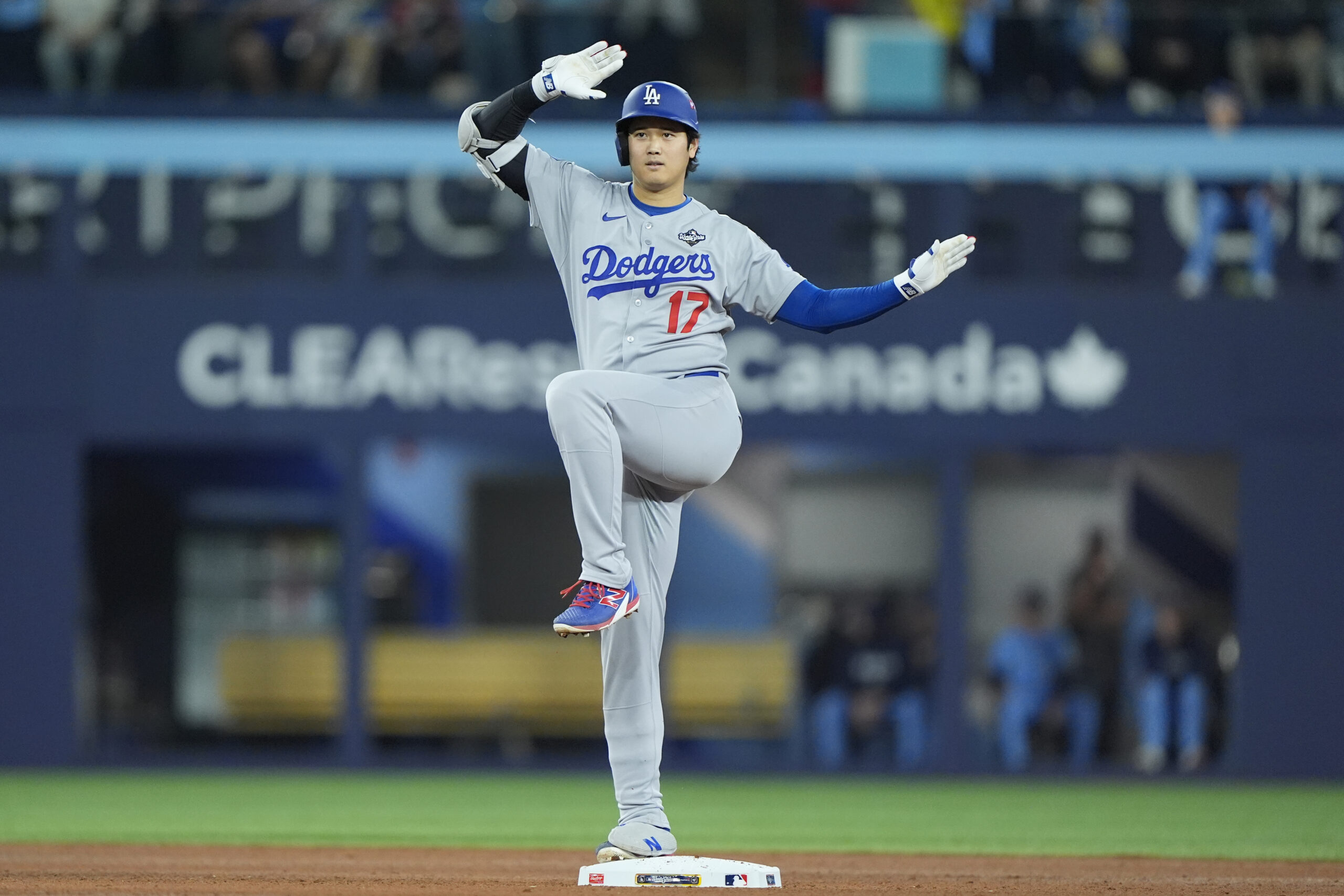 Oct 31, 2025; Toronto, Ontario, CAN; Los Angeles Dodgers two-way player Shohei Ohtani (17) celebrates after hitting a double against the Toronto Blue Jays in the eighth inning during game six of the 2025 MLB World Series at Rogers Centre. Mandatory Credit: John E. Sokolowski-Imagn Images