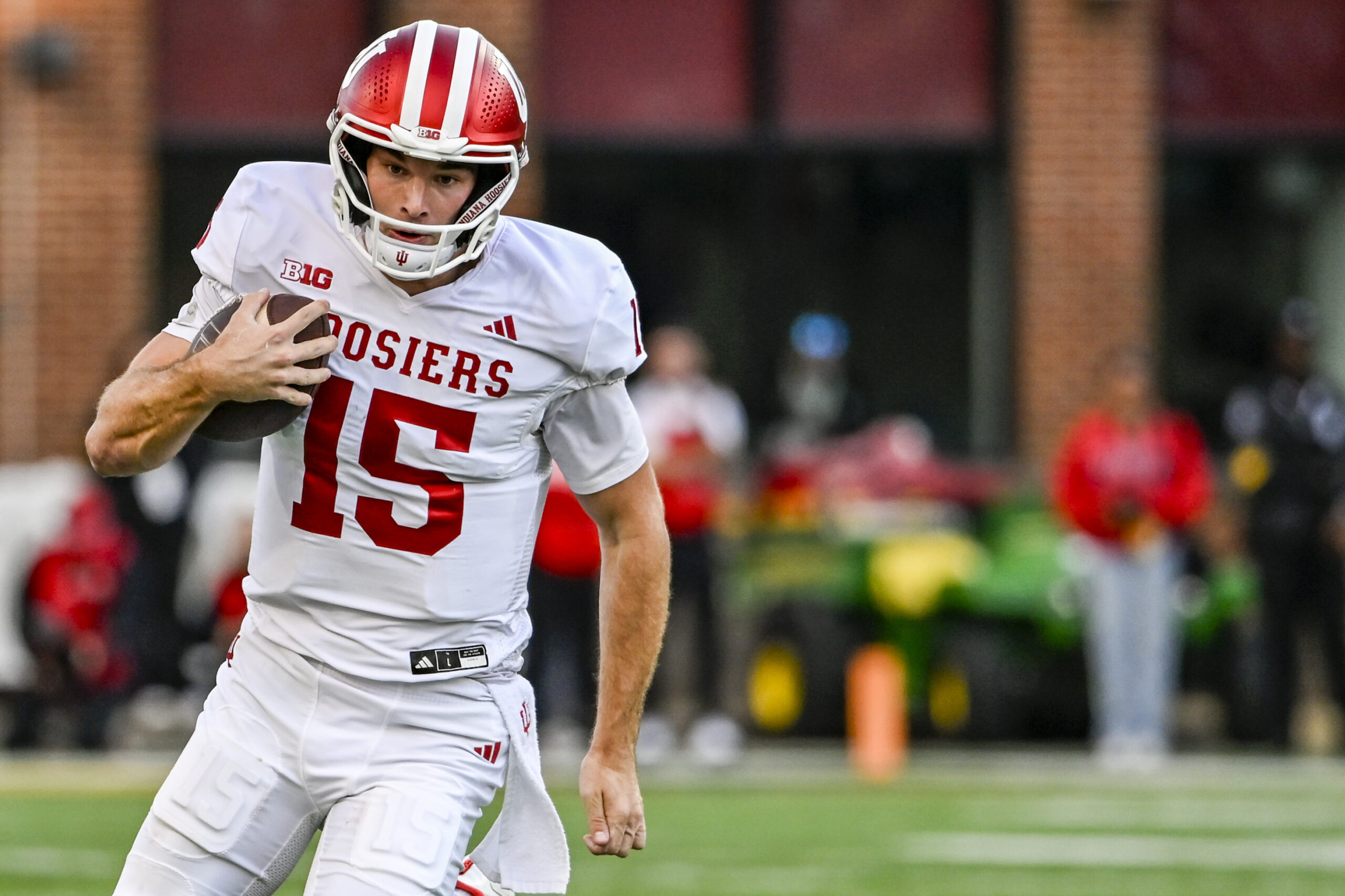 Nov 1, 2025; College Park, Maryland, USA;  Indiana Hoosiers quarterback Fernando Mendoza (15) rushes during the first half against the Maryland Terrapins at SECU Stadium. Mandatory Credit: Tommy Gilligan-Imagn Images