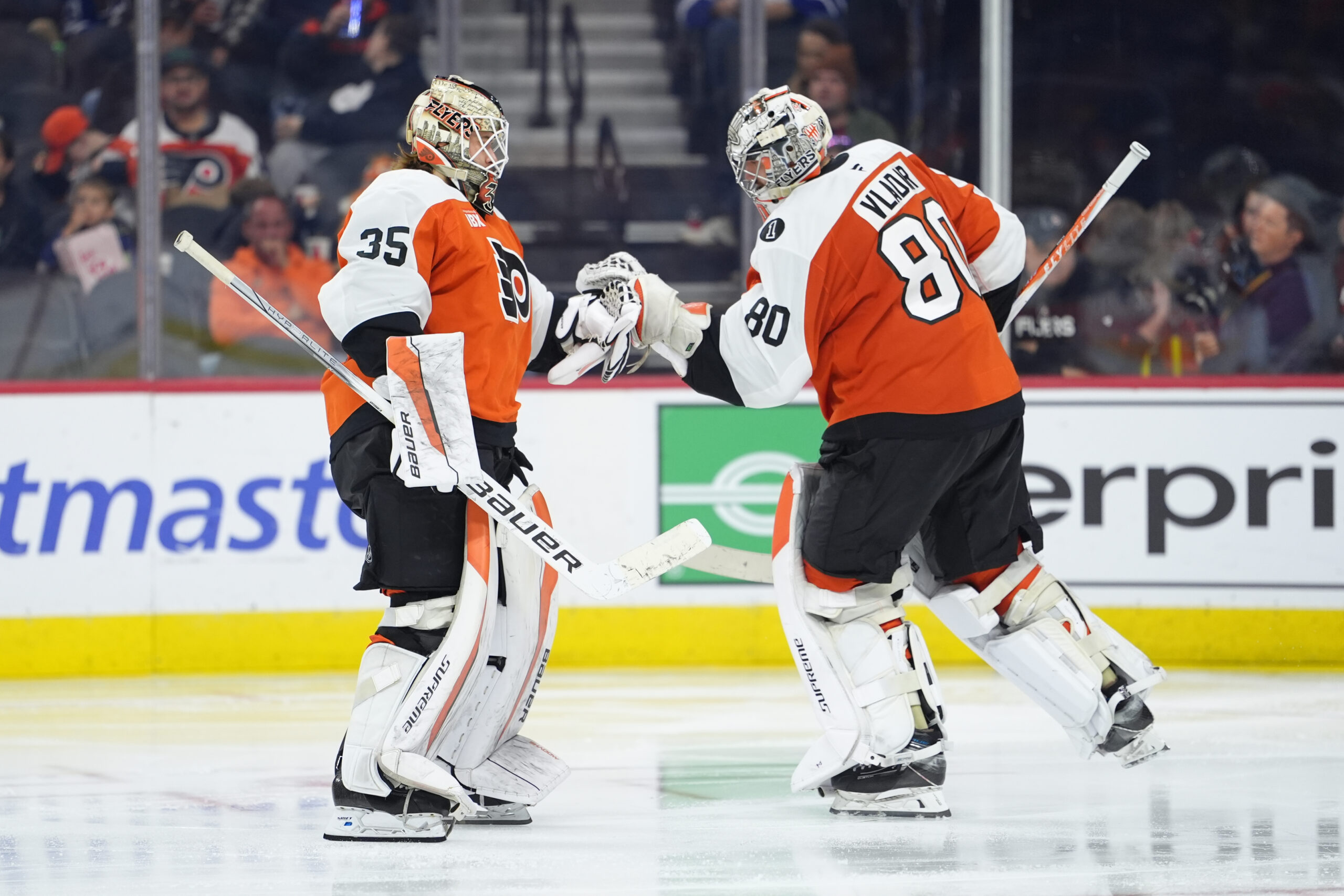 Nov 1, 2025; Philadelphia, Pennsylvania, USA; Philadelphia Flyers goalie Aleksei Kolosov (35) is substituted into the game for goalie Dan Vladar (80) against the Toronto Maple Leafs in the third period at Xfinity Mobile Arena. Mandatory Credit: Kyle Ross-Imagn Images