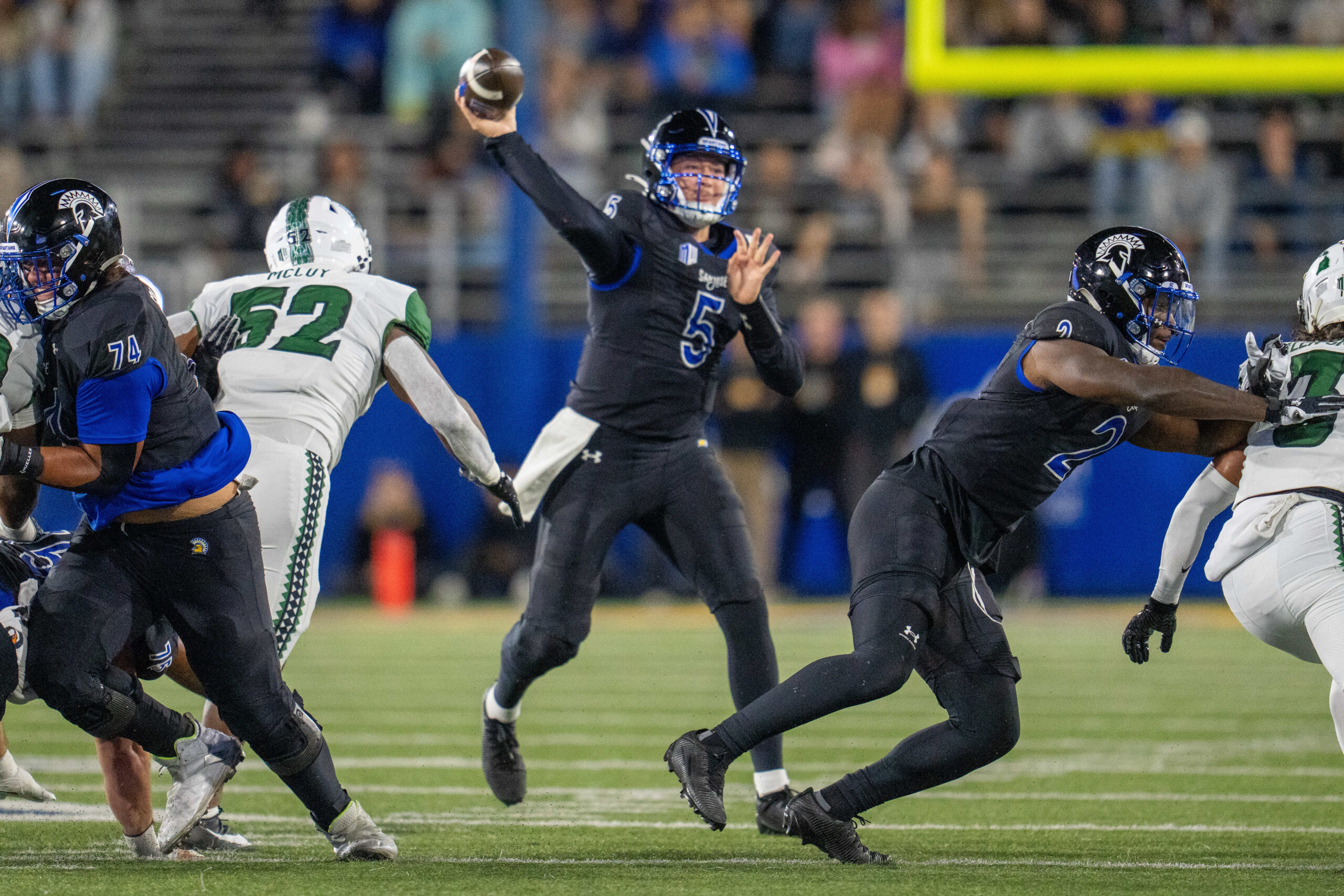 Nov 1, 2025; San Jose, California, USA; San Jose State Spartans quarterback Walker Eget (5) passes the football against the Hawaii Rainbow Wahine during the first quarter at CEFCU Stadium. Mandatory Credit: Neville E. Guard-Imagn Images
