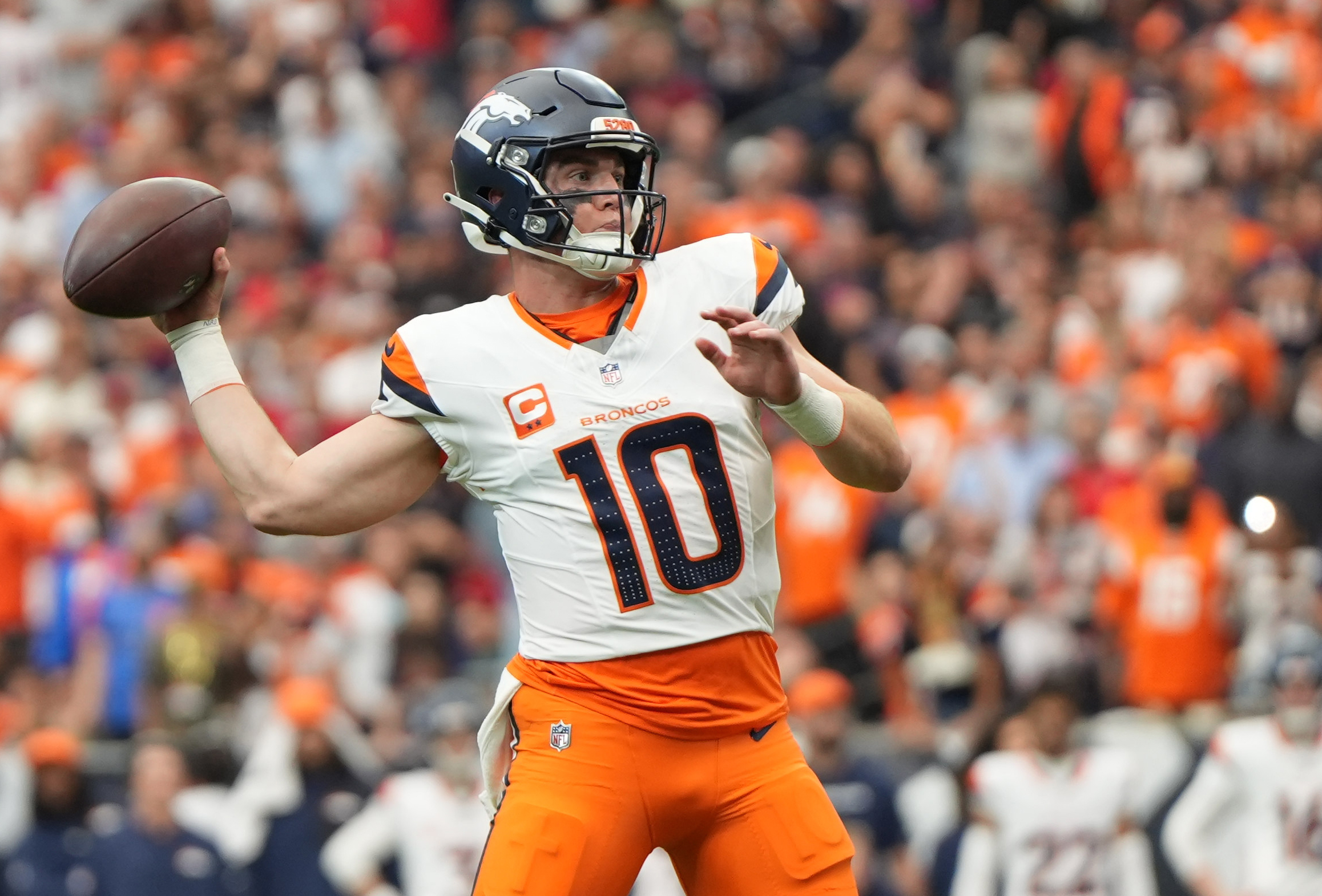 Nov 2, 2025; Houston, Texas, USA; Denver Broncos quarterback Bo Nix (10) throws during the second half against the Houston Texans at NRG Stadium. Mandatory Credit: Sean Thomas-Imagn Images