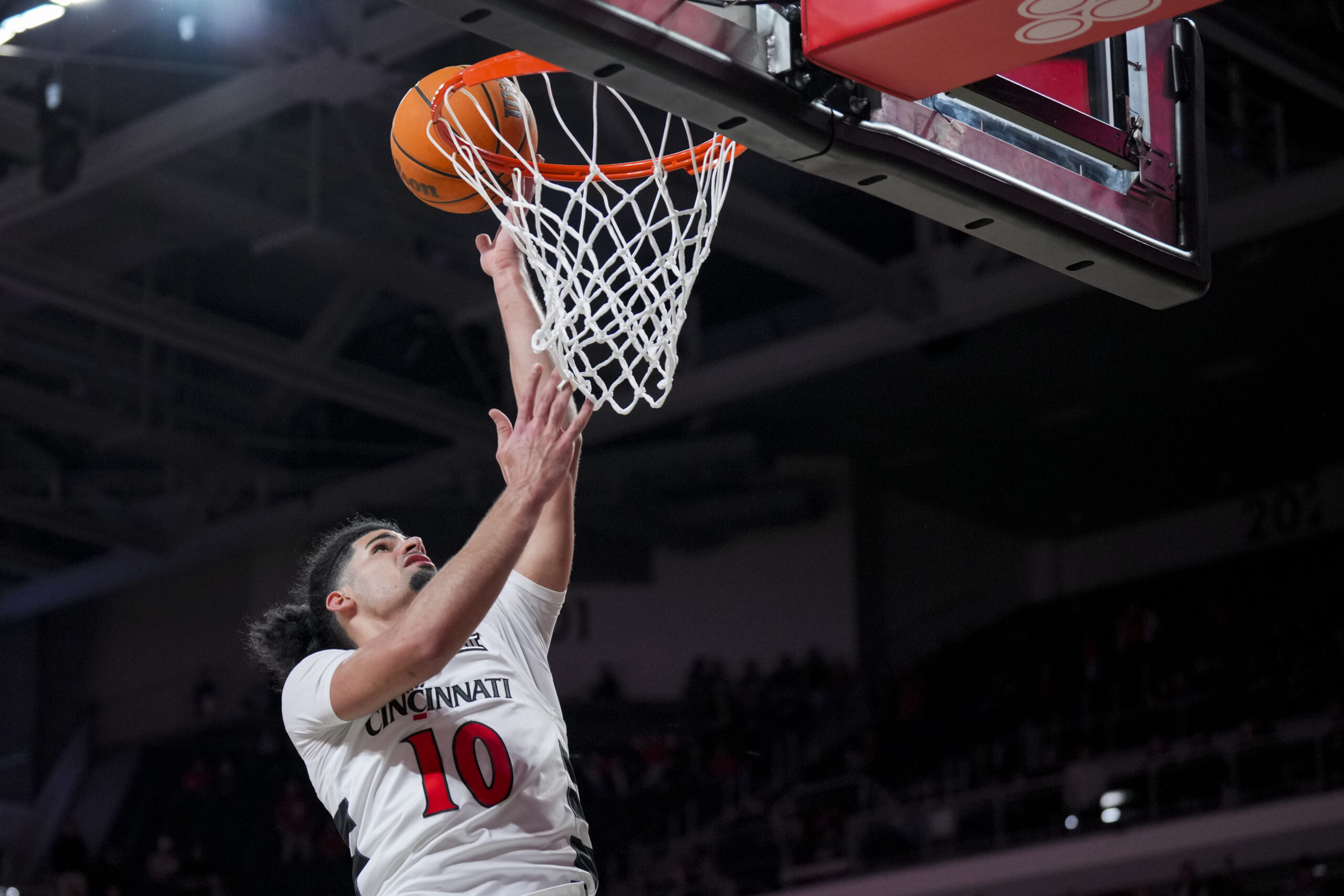 Nov 3, 2025; Cincinnati, Ohio, USA;  Cincinnati Bearcats guard Shon Abaev (10) drives to the basket against the Western Carolina Catamounts in the second half at Fifth Third Arena. Mandatory Credit: Aaron Doster-Imagn Images