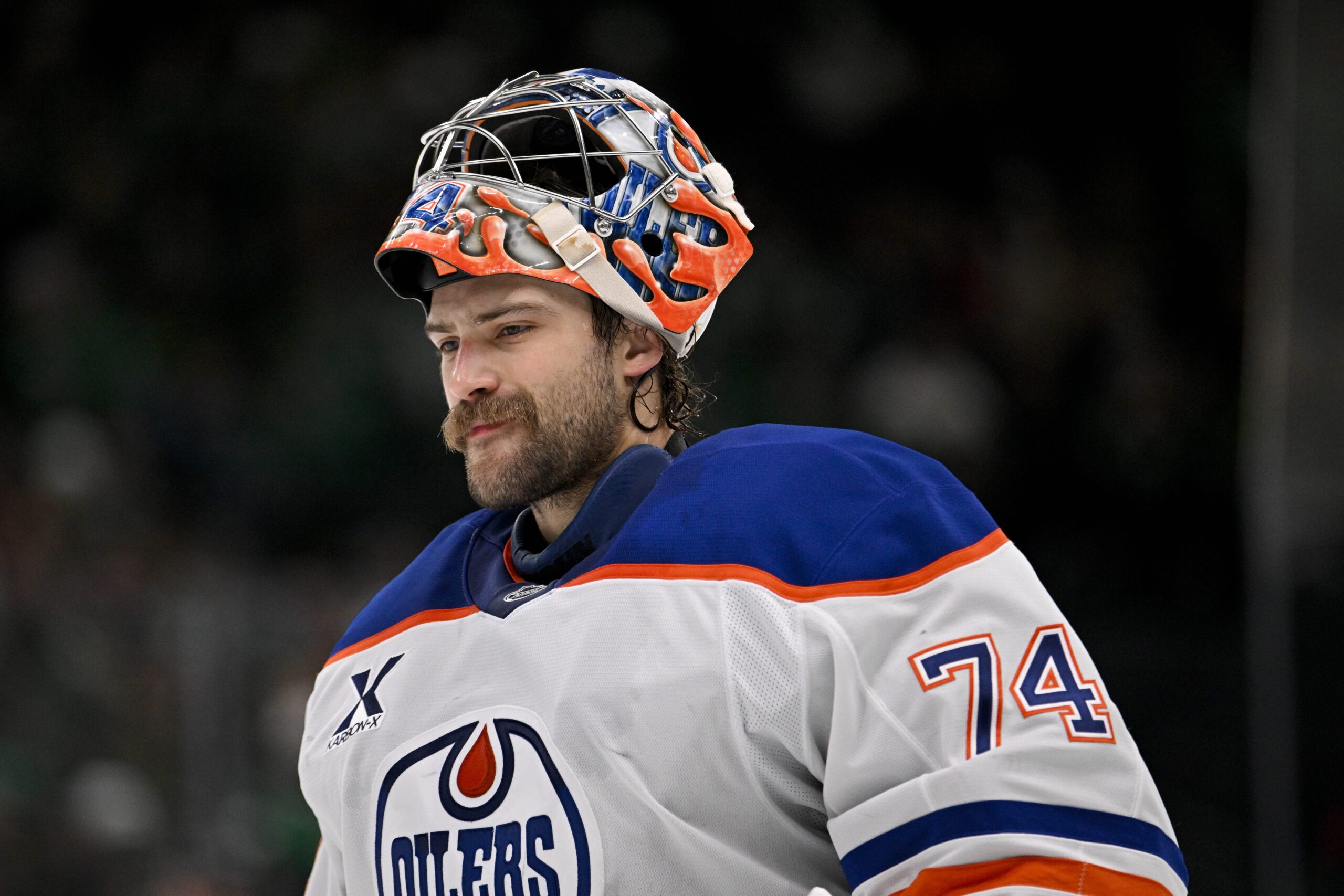 Nov 4, 2025; Dallas, Texas, USA; Edmonton Oilers goaltender Stuart Skinner (74) skates back on the ice during the overtime period against the Dallas Stars at the American Airlines Center. Mandatory Credit: Jerome Miron-Imagn Images