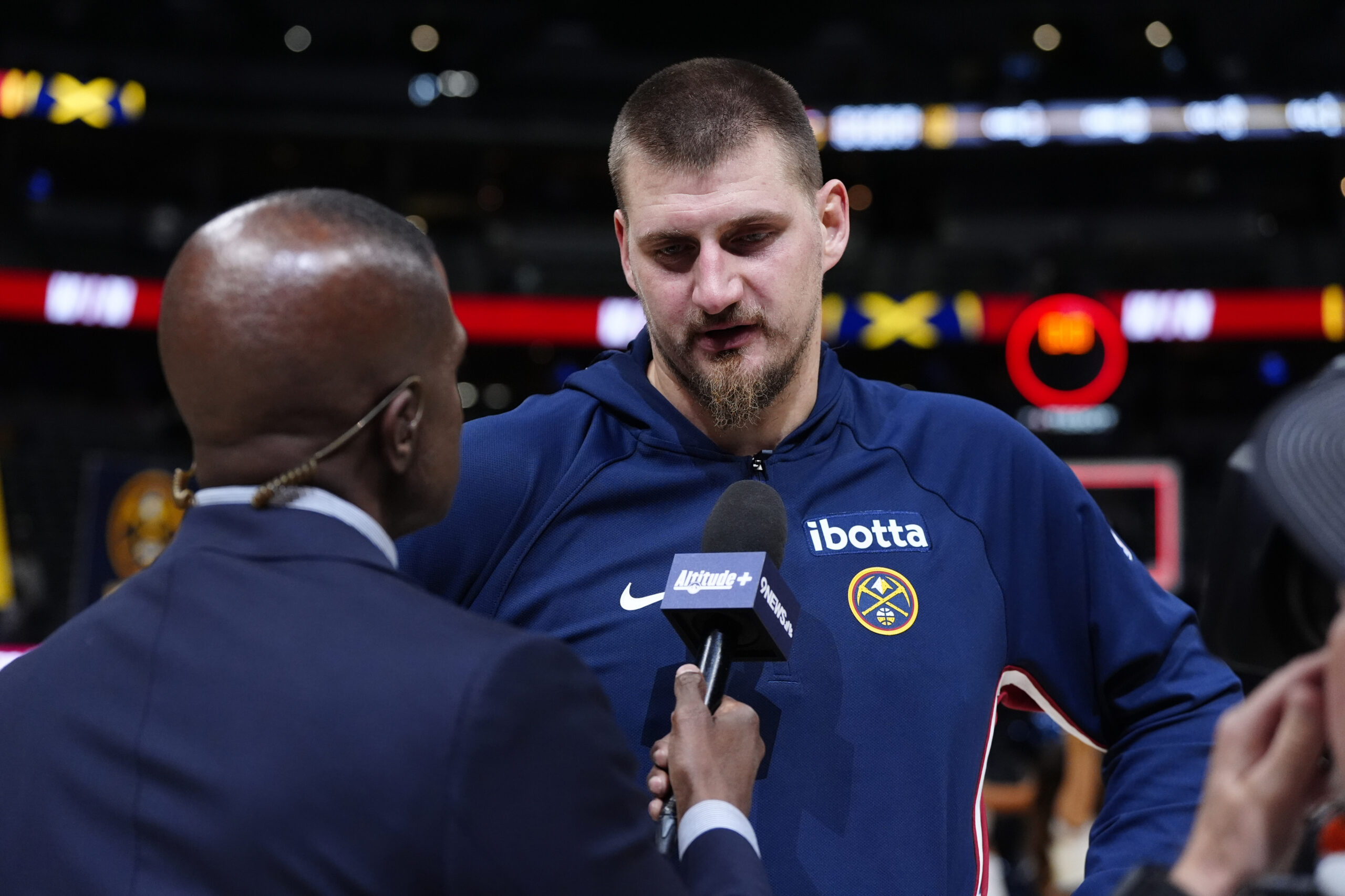 Nov 5, 2025; Denver, Colorado, USA; Denver Nuggets center Nikola Jokic (15) is interviewed following the win against the Miami Heat in the second half at Ball Arena. Mandatory Credit: Ron Chenoy-Imagn Images