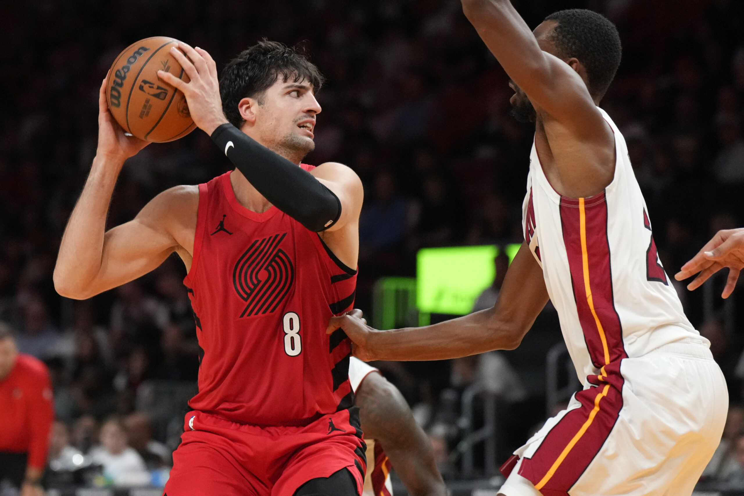 Nov 8, 2025; Miami, Florida, USA;  Portland Trail Blazers forward Deni Avdija (8) looks to pass as Miami Heat forward Andrew Wiggins (22) defends during the second half at Kaseya Center. Mandatory Credit: Jim Rassol-Imagn Images