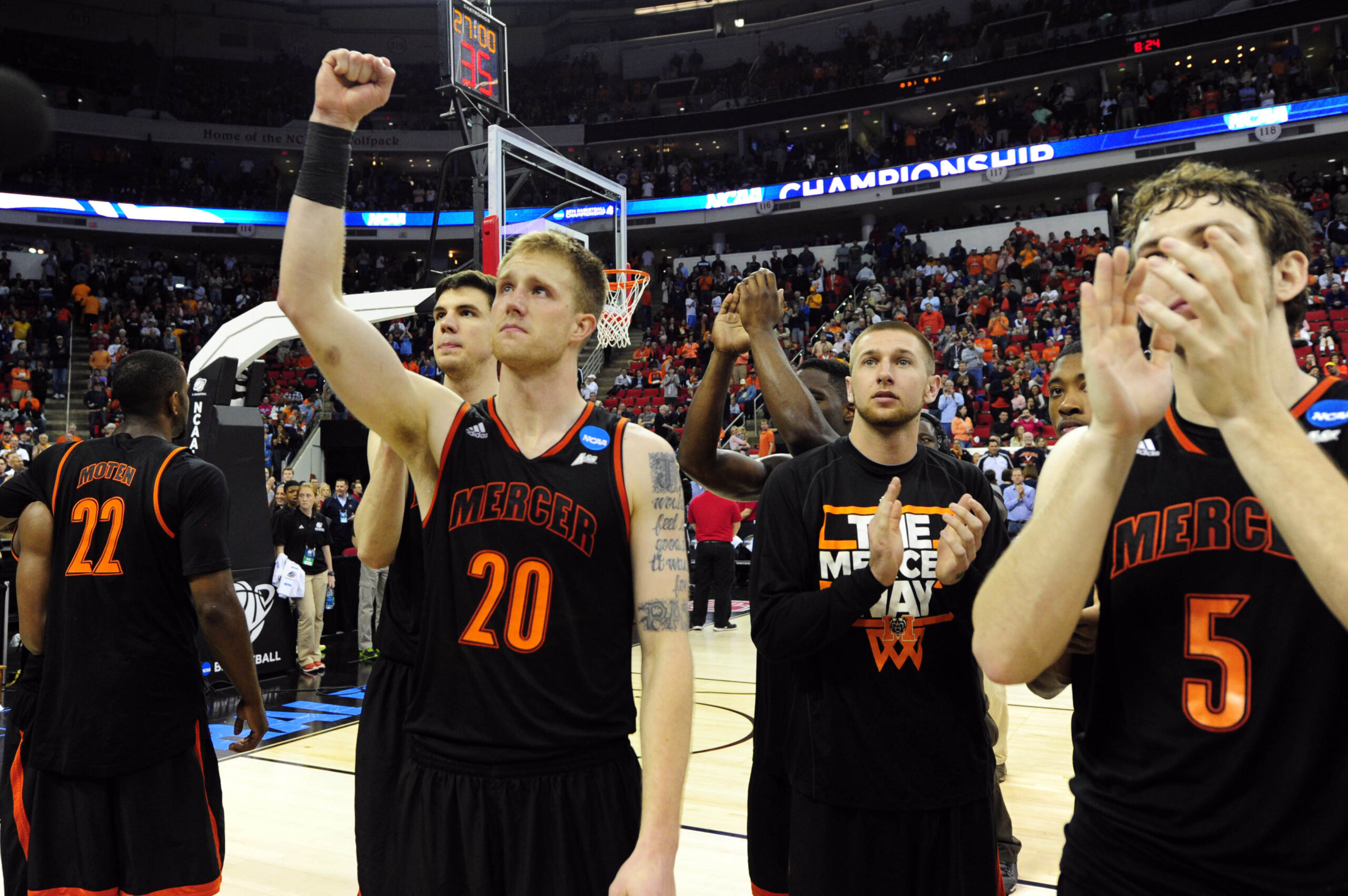 Mar 23, 2014; Raleigh, NC, USA; Mercer Bears guard Ike Nwamu (10) recognizes the fans after loosing to the Tennessee Volunteers in a men's college basketball game during the third round of the 2014 NCAA Tournament at PNC Arena. Mandatory Credit: Bob Donnan-Imagn Images