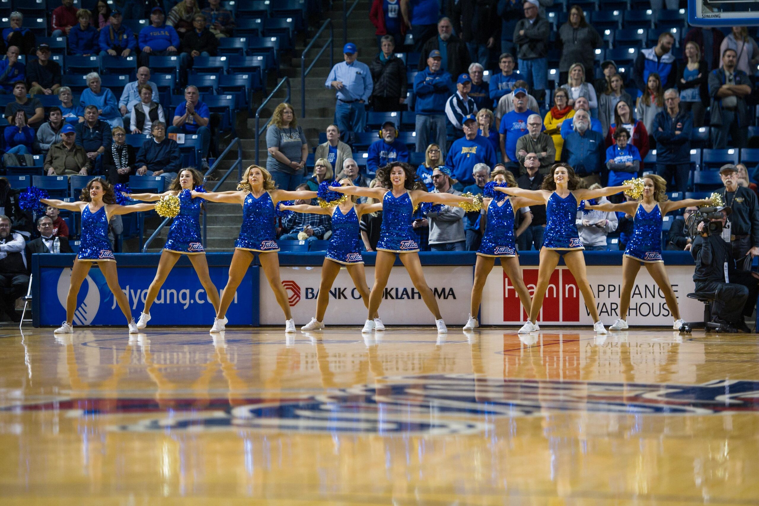 Dec 31, 2016; Tulsa, OK, USA;  Tulsa Golden Hurricane cheerleaders perform during a timeout in the game against the Connecticut Huskies in overtime of the game at Donald Reynolds Center. TU won 61-59. Mandatory Credit: Brett Rojo-Imagn Images